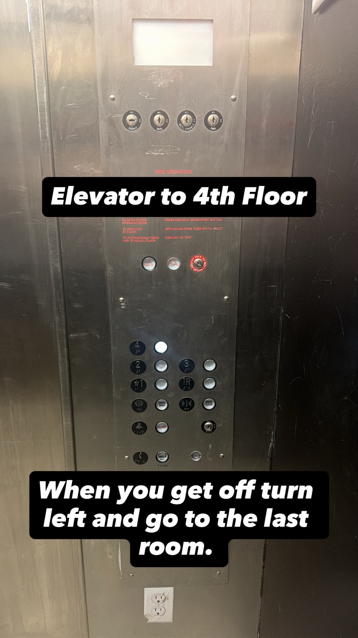 Elevator panel showing 4th floor button