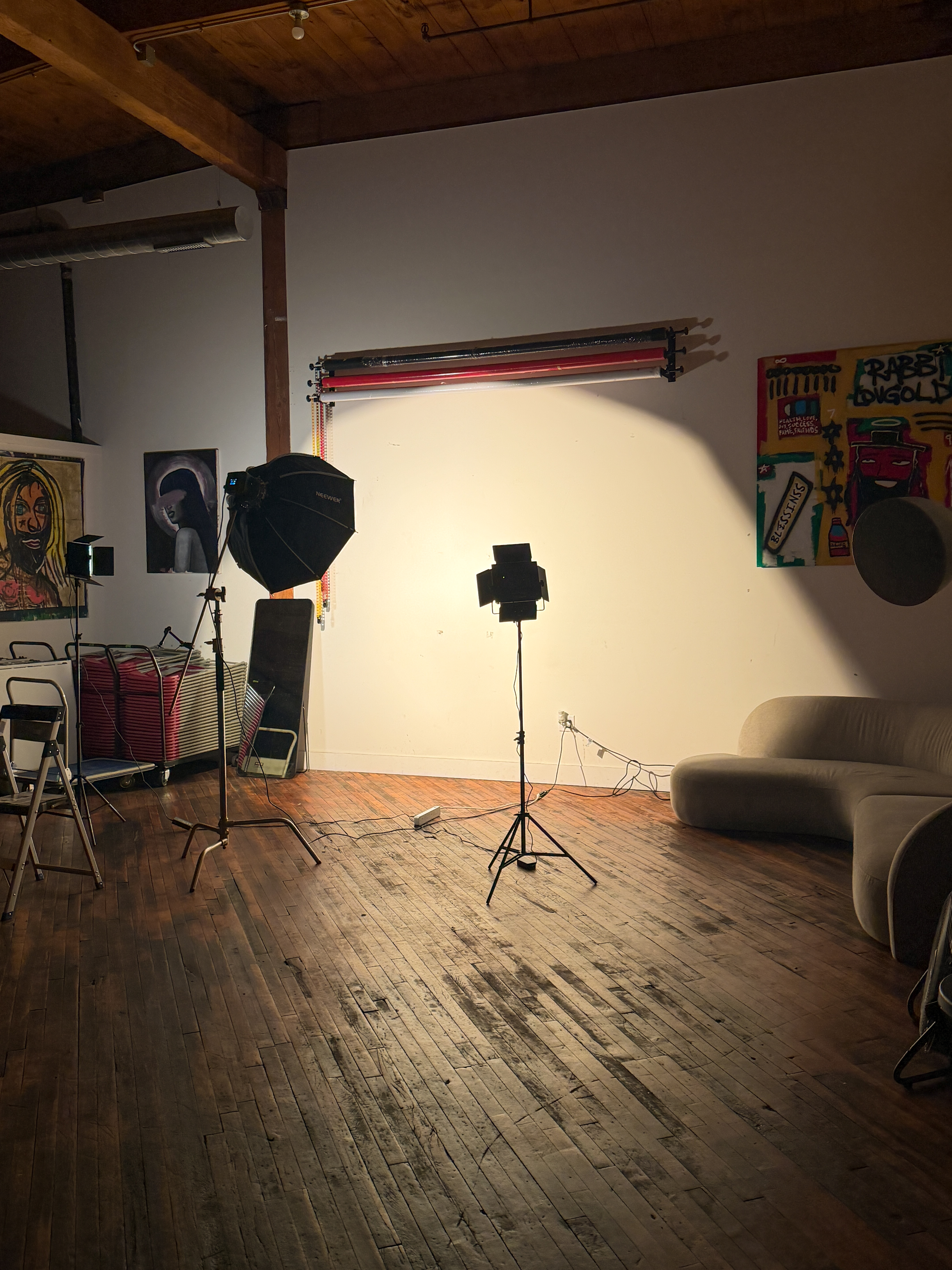 The Loft 215 photo studio with professional lighting and backdrop